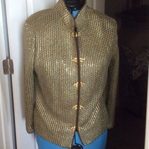 Gold St. John suit and la Perla top.