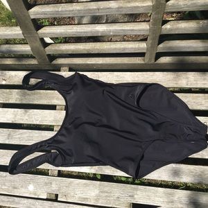 New black one piece with low open back