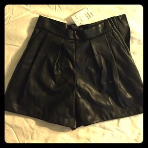 Black leather shorts