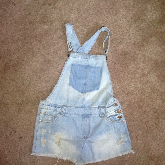 Light Wash denim overalls.