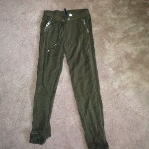 Olive Green zippered pocket Jogger type pants.
