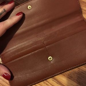 Thin coach wallet