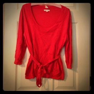 Adorable scoop neck sweater with waist tie