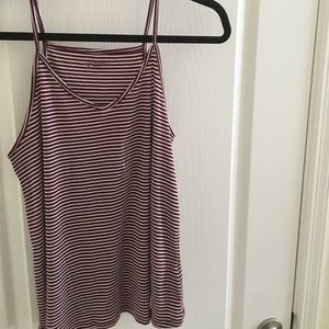 A maroon and white striped ribbed tank top.