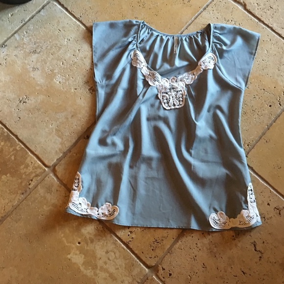 Baby blue size medium blouse with lace detail