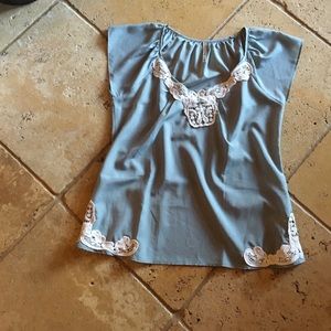 Baby blue size medium blouse with lace detail