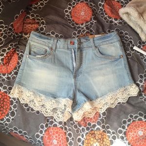 High rise denim shorts with lace trim