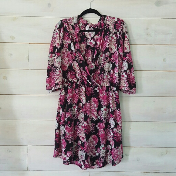 Beautiful pink floral dress with plunging neck lin