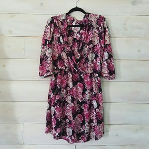 Beautiful pink floral dress with plunging neck lin