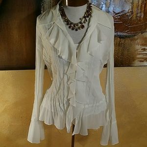 Notations off white or cream colored blouse
