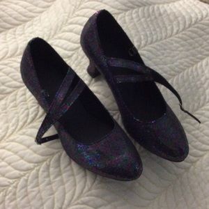 Glittery blue dancing shoes.
