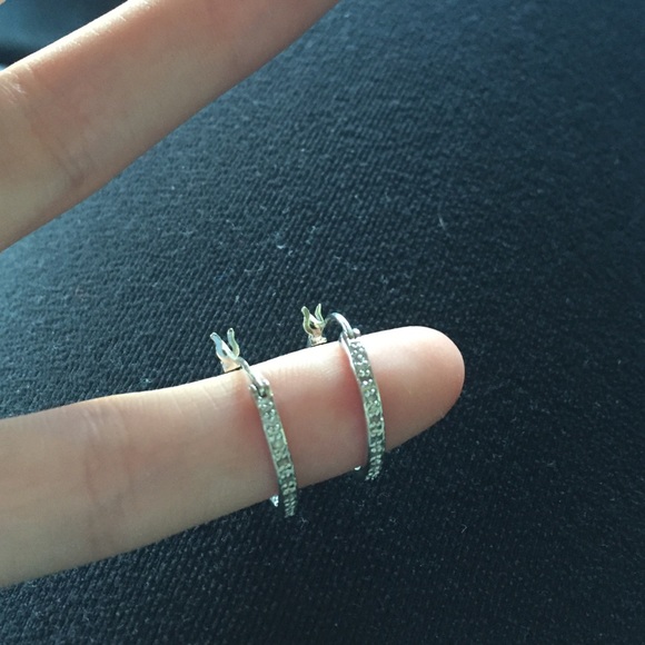 Sterling silver hoop earrings.