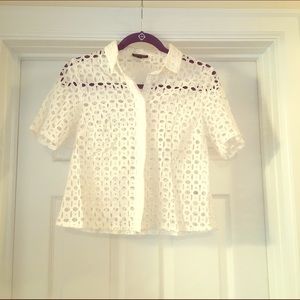 Stylish white eyelet shirt by Topshop!