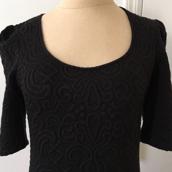 Never worn black Anthro print top