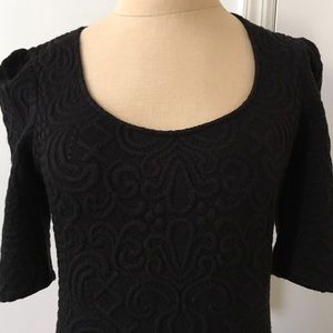 Never worn black Anthro print top