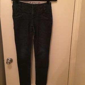 Tabbed dark-wash skinny jeans
