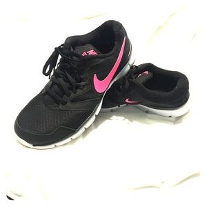 Black and pink Nikes