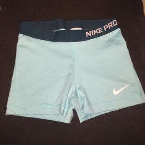 Tiffany blue Nike Pros