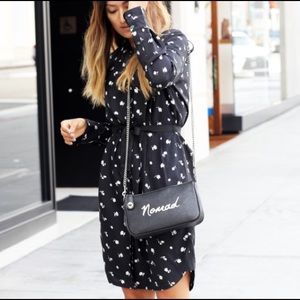 Nomad cross body in pebble leather bag. New