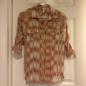 Oversized buttoned down shirt.