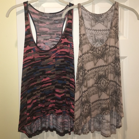 Two size medium patterned Rubbish tank tops!