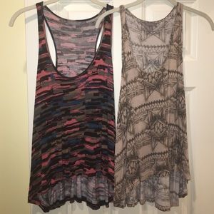 Two size medium patterned Rubbish tank tops!