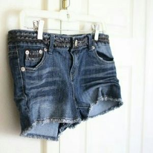 dark denim shorts with black detail.