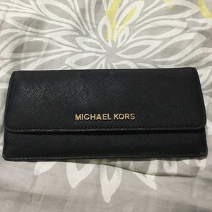 Black with gold zipper Michael Kors wallet