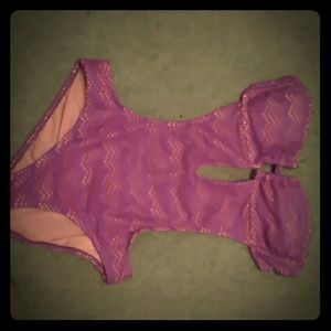 A sexy pink and purple one piece