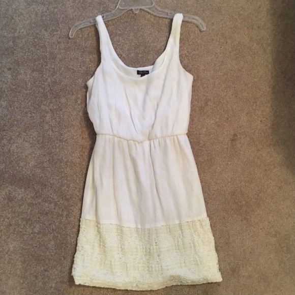 White sleeveless dress with lace detailing