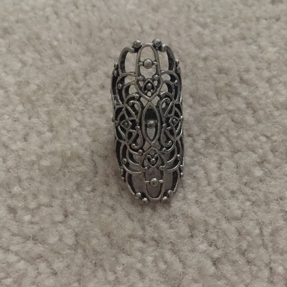 Silver design long ring