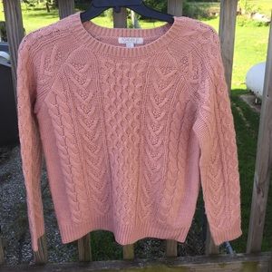 Pink cable-knit sweater