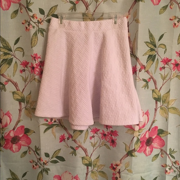 White skirt with chevron patterned stitching