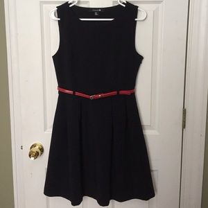 Dark navy/black fit/ flare dress with red belt