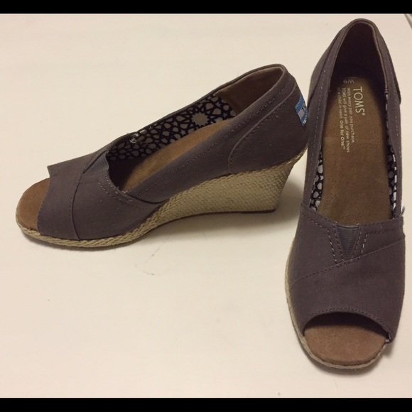 Brand new Toms ash gray canvas wedges