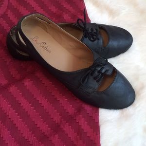 Black cutout flats