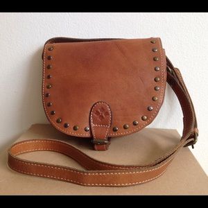 Patricia Nash leather small flap cross body bag.