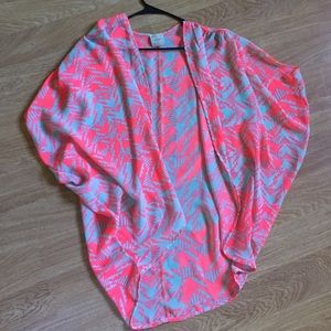 Bright hot pink kimono with an Aztec style pattern