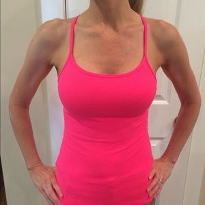 Hot pink lululemon workout top with shelf bra