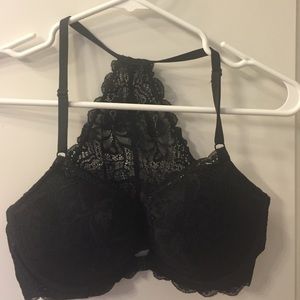 Never worn Black, lacy racerback bra.