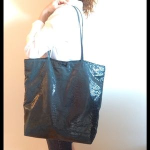 Carlos Falchi snake print large tote bag.