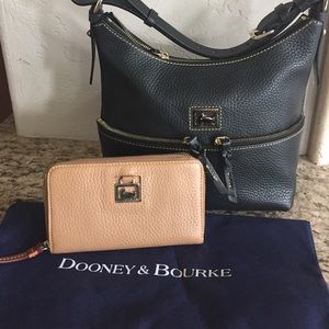 Beautiful Dooney & Bourke tan wallet.