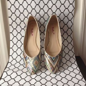 Pretty multi- colored shimmery flats. Size 7.
