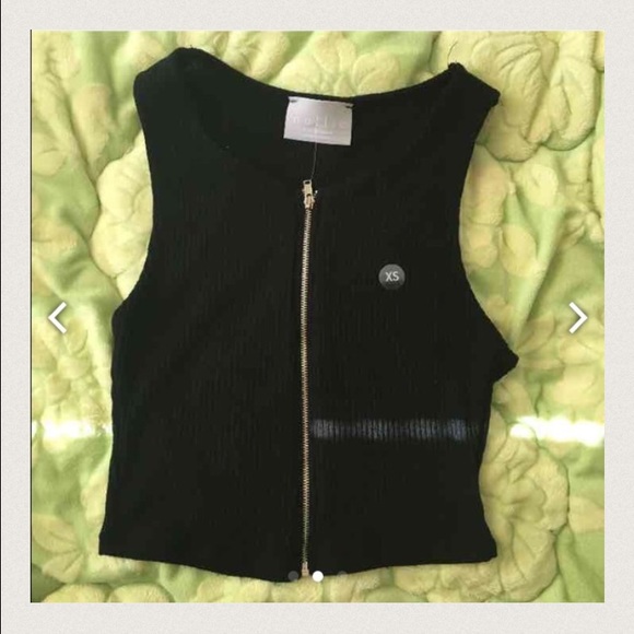 One left! 😳 Pac Sun Nollie tank