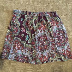 Purple, patterned mini skirt.