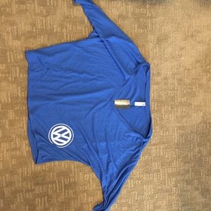Volkswagen bug driver apparel. Blue shirt.