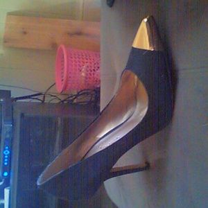 Black heel with gold tip