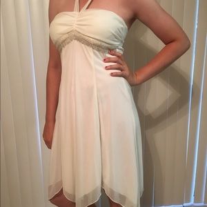 Halter top dress with asymmetrical bottom