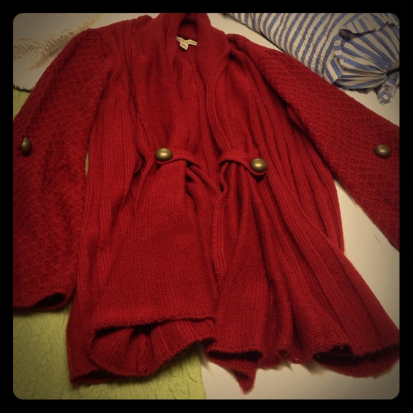 Rust colored shawl sweater with gold detailing