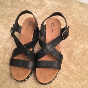 Black spiked platforms